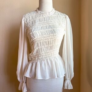 En Saison Cream Smocked Peplum Blouse